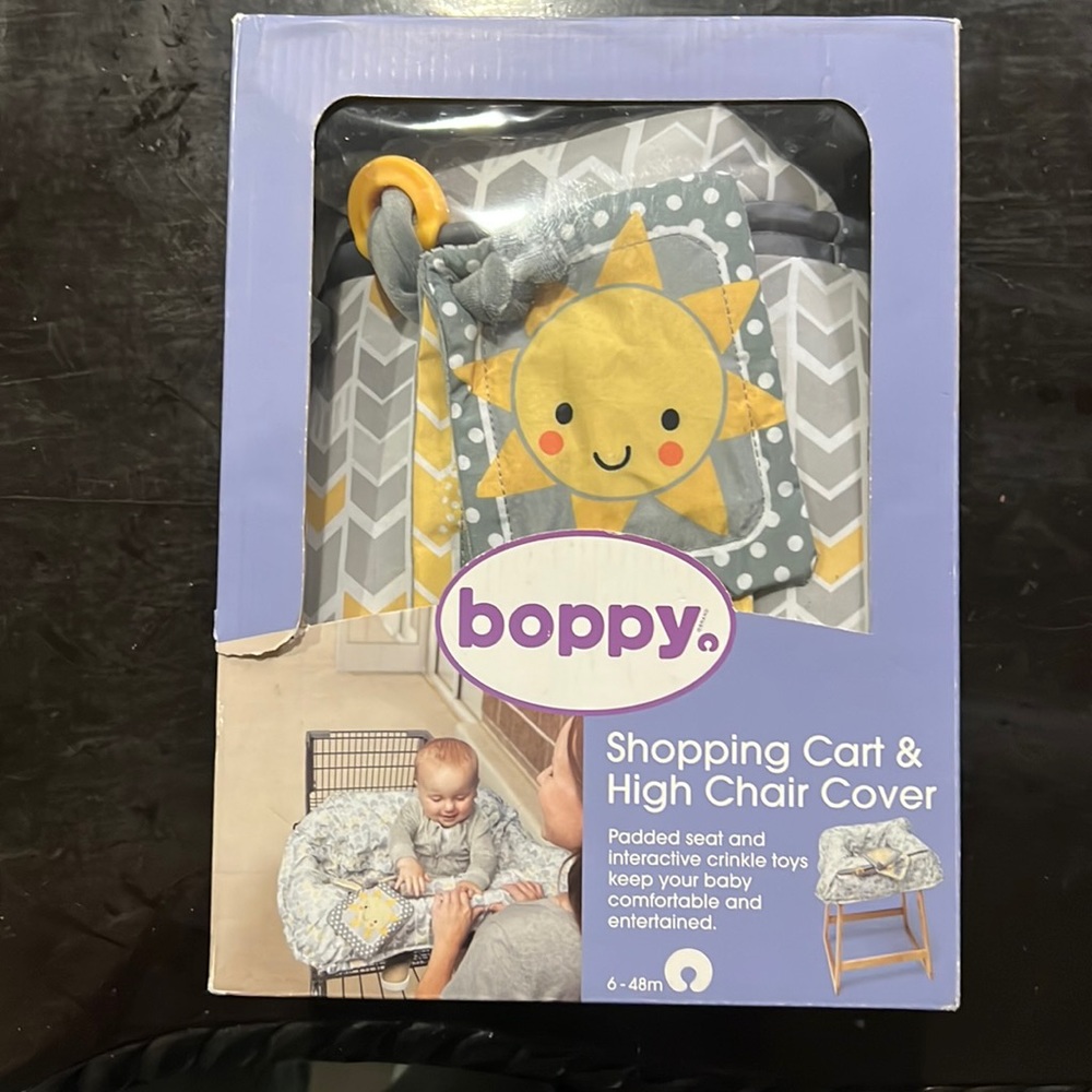 Brand New Boppy Shopping Cart & High Chair Cover.
